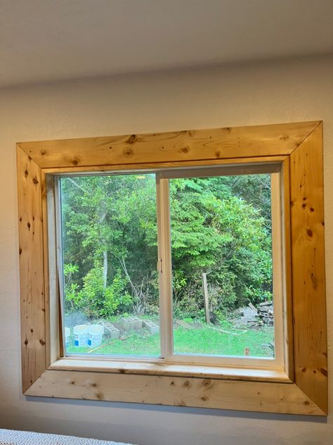 Recycled pallet boards for a window sill and trim I did for my parents bedroom. Turned out pretty good. Wood Trimmed Windows, Wood Framed Interior Window, Wood Lined Window, Diy Rustic Window Frame, Rustic Window Trim Wood, Rustic Window Trim, Pallet Wood Window Trim, Rv Wood Window Trim, Oak Window Sill