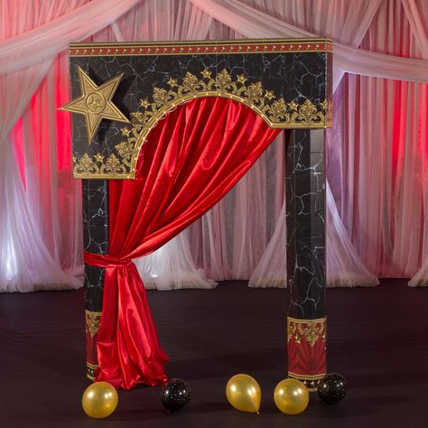 Use our Lights, Camera, Party! Balcony Entrance to create an entryway or photo background fit for the stars. This freestanding arch is accented with a gold Hollywood star and glamorous red satin material. Made of cardboard and satin Measures 8' 10" high x 6' 8" wide x 1' 4" deep Arch opening measures 7' high x 4' 7" wide Assembly required Balloons and background materials are not included Prom Theme Party, Balcony Entrance, Runners Next To Bed, Red Satin Fabric, Creating An Entryway, Hollywood Party Theme, Glamorous Decor, Photo Booth Background, Custom Yard Signs