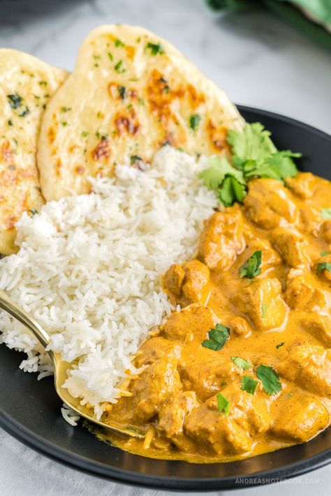 This easy stovetop butter chicken recipe is perfect for a flavorful and satisfying 30 minute weeknight dinner. Marinated chicken pieces are cooked in a creamy tomato-based sauce that is seasoned with aromatic spices and a touch of butter or ghee. This recipe comes together quickly on the stovetop and is perfect served with rice or naan bread. Impress your family and friends with this delicious, Indian-inspired dish that's sure to become a new favorite. Gluten-free and dairy-free variations ... Butter Chicken With Garlic Naan, Butter Chicken With Naan Bread, Butter Chicken Without Yogurt, Light Butter Chicken Recipe, Fun Easy Healthy Meals, Butter Chicken Appetizer, Naan Bread And Chicken, Naan Bread With Chicken, What To Eat With Naan Bread Dinners