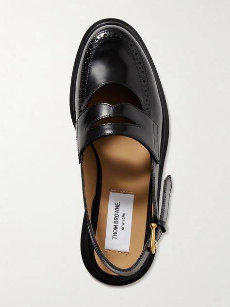 "Find THOM BROWNE Cutout Leather Slingback Loafers on Editorialist. Thom Browne specializes in \"challenging and modernizing today's uniform\"; as these loafers prove. Crafted from leather, they have scalloped edges and slingback straps to secure the fit. Echo the brand's design codes and style yours as part of a preppy outfit." Slingback Loafers, Modern Preppy Style, Preppy Brands, Slingback Flats, Preppy Outfit, Scalloped Edges, Penny Loafers, Thom Browne, Leather Loafers