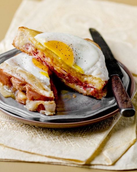 Croque-Madame Recipe - NYT Cooking Croque Madame Recipe, Ham And Gruyere, Christmas Breakfast Recipe, Country Bread, Croque Madame, Clam Recipes, Nyt Cooking, Christmas Breakfast, Wrap Sandwiches