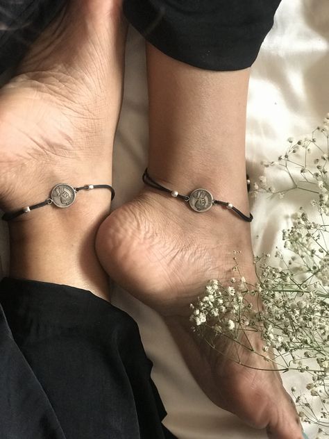 These nazariya anklet pair is a beautiful piece of jewelry complete with silver coins and beads attached to black thread. Thread Anklets, Silver Aesthetic, Jewelry Black, Handmade Jewelry Designs, Black Thread, Silver Coin, Silver Coins, Jewelry Designs, Anklets