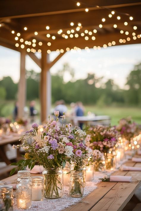 Stunning DIY wedding centerpiece ideas are the key to impressing your guests while staying within budget! Discover creative and elegant designs that add a personal touch to your special day. Save money and spark joy with these beautiful arrangements. Save this pin for your wedding planning journey!  #WeddingCenterpieces #DIYWeddingIdeas #WeddingPlanning #BudgetBride #WeddingDecor #CreativeWedding #FloralDesign #BrideToBe #WeddingInspiration #RusticWedding #ElegantDecor #UniqueBridalIdeas #WeddingTrends #PersonalizedWeddings #CostEffectiveWeddings #EventPlanning Simple Rustic Wedding Centerpieces Mason Jars, Outdoor Spring Reception Ideas, Wedding In Spring Ideas, Simple Garden Wedding Decorations, Modern Farm Wedding Ideas, Head Table Wedding Decorations Rustic Country Chic, Wedding Centerpieces Farm Table, Wedding Rustic Elegant, June Rustic Wedding