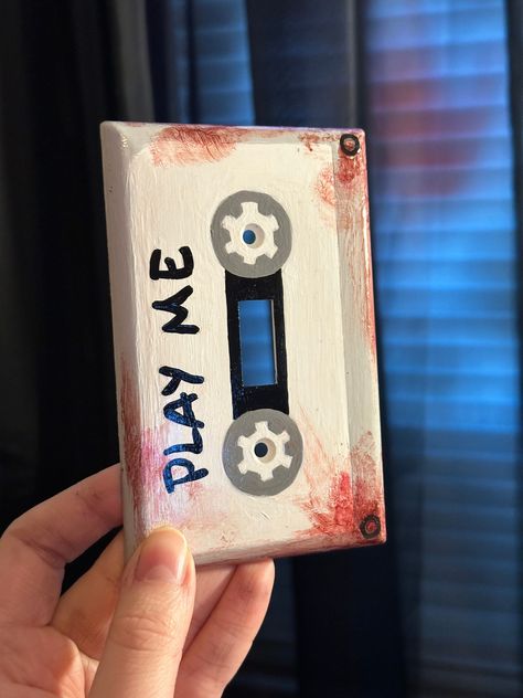 Hand painted saw light switch cover. Perfect for any horror fans. Bedroom Light Switch Ideas, Chaotic Home Decor, Light Switch Covers Painting, Light Switch Covers Paint, Light Switch Covers Ideas, Cool Light Switch Covers, Outlet Painting Ideas Easy, Light Switch Painting, Outlet Cover Painting Ideas