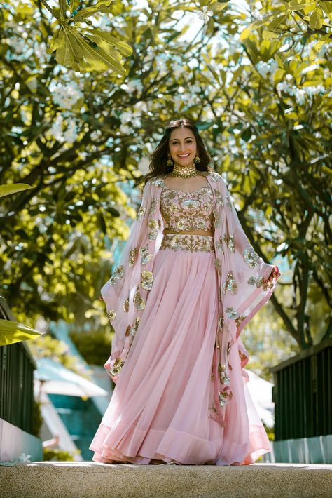 This blush pink lehenga with an all-sequinned blouse and a cape style dupatta looks so classy! #pink #lehenga #mehndi #bridal #indianweddings #indianbride #modern Weddings 2024, Mehendi Outfits, Lehnga Dress, Pink Gown, Pink Lehenga, Indian Bridal Dress, Indian Gowns Dresses, Patiala Salwar, Lehenga Collection