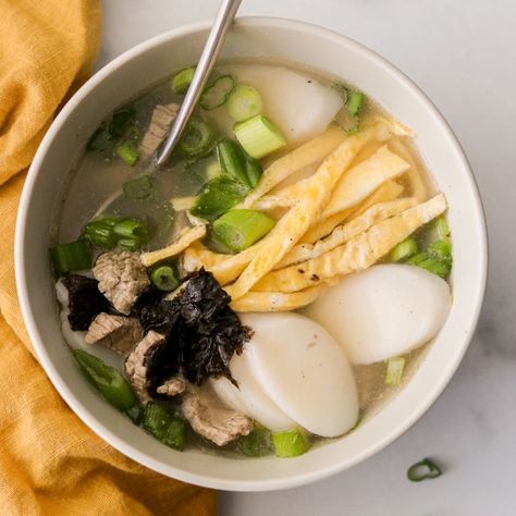 TteokGuk | Korean Rice Cake Soup Korean Oxtail Soup, Korean Rice Cake Soup, Rice Cake Soup, Oxtail Soup, Korean Rice Cake, Cozy Soup, Korean Rice, Wealth And Prosperity, Great Grandma