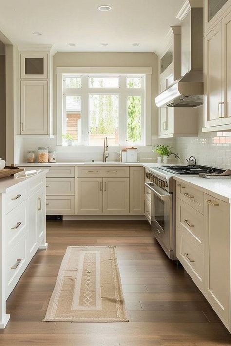 14 Fresh Kitchen Cabinet Trends Kitchen Wood Floors White Cabinets, Light Wood Floor Kitchen, White Kitchen Dark Floors, Minimalist White Kitchen, Cream And White Kitchen, Ivory Kitchen Cabinets, Beautiful Kitchen Countertops, Vanilla Kitchen, Small Kitchen Cabinet Design