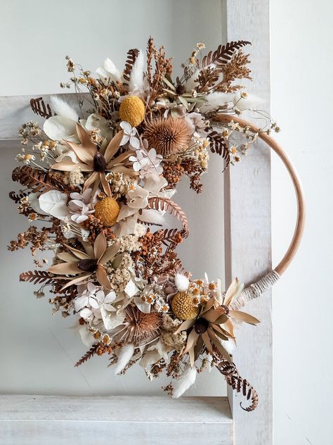 Dried flower wreaths offer a unique way to bring nature indoors and enliven a space with floral decor. As lasting floral art pieces, dried flower wreaths celebrate a love of nature and can be used to highlight the changing seasons. They also make meaningful one-of-a-kind gifts for someone special and suitable for any o Dried Floral Wreaths, Dried Flower Wreath, Dried Wreath, Bring Nature Indoors, Billy Buttons, Boho Wedding Flowers, Flower Wreaths, Dried Flower Wreaths, Dried Florals