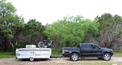 diy camper bicycle rack, diy, outdoor living, Bikes loaded and ready to go Diy Outdoor Living, Chandelier Planter, Yard Dice, Planter Project, Camping Park, Bike Camping, Bicycle Rack, Pop Up Camper, Bicycle Race