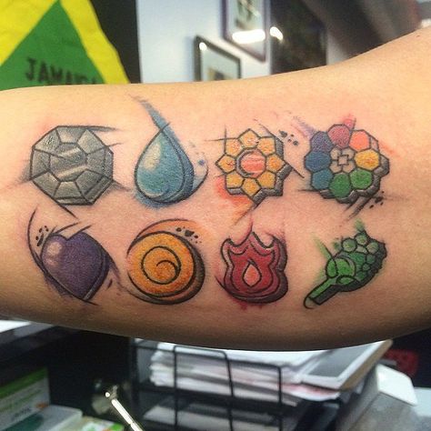 Ink Them All With These 60 Pokemon Tattoos Pokemon Gym Badges Tattoo, Badge Tattoo, Pokemon Gym Badges, Evolution Tattoo, Pokemon Tattoos, Video Game Tattoos, Tattoo Sleeve Filler, Gym Badges, Pokemon Badges