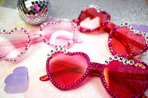 Handmade rhinestoned color sunglasses made for Taylor Swift’s Lover Album. Accessories for The Eras Tour. Glasses say “Lover”, “Miss Americana”, and “Cruel Summer” and are available for sale on Etsy. Eras Tour Lover Accessories, Taylor Swift Glasses Diy, Midnights Outfit, Swiftie Birthday, Swiftie Party, Eras Tour Lover, Disco Birthday Party, Guts Tour, Taylor Swift Tour Outfits