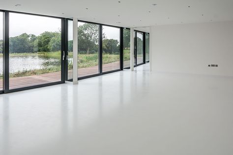 Installation Date: April 2016 Location: Kent Flooring Type: Resin Floor Flooring Colour: White 350m2 rubber crumb base and poured resin finished in white. Two kitchens, WC, Hallway and corridors, lounge, T.V. room, bedroom, dressing room and two staircases. A water based underfloor heating system was also installed. Cemcrete Floors, Gloss Floor Tiles, White Concrete Floors, Living Room Flooring Ideas, Colours 2023, Room Flooring Ideas, White Painted Floors, Micro Concrete, Resin Floors