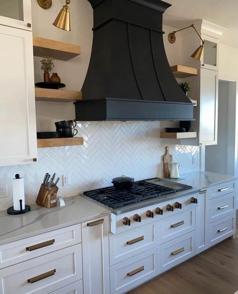 16 Brilliant Black Range Hood Ideas to Upgrade Your Kitchen Range Hood Floating Shelves, White Herringbone Tile Backsplash, White Herringbone Backsplash, Kitchen Hood Vent, Black Range Hood, Kitchen Hood Ideas, White Herringbone Tile, Herringbone Tile Backsplash, Farmhouse Kitchen Backsplash