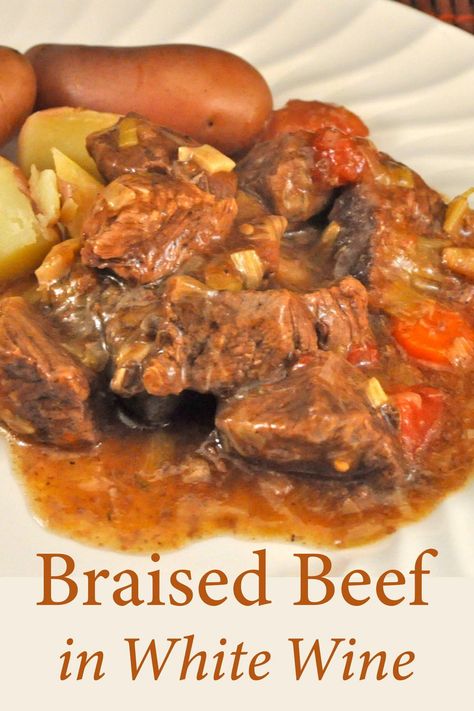 Braised Beef in White Wine. White gives a lighter flavor than red and is a typical Alsatian stew. With Carrots and Mushrooms #BeefStew #BeefWhiteWine #AlsatianStew #BraisedBeef White Wine Recipes, Beef And Vegetables, Cooking With White Wine, Wine Recipe, Beef Cheeks, Wine White, Beef Stew Meat, Braised Beef, French Cooking