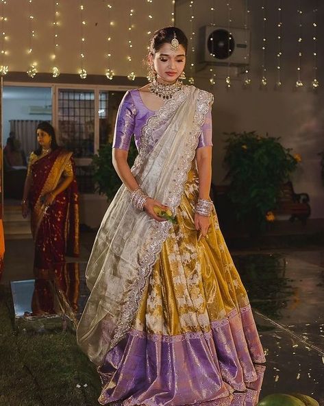 Leave a little sparkle where ever u go ✨ @sahaja93 looking graceful and elegant in our lustrous golden Kalidar lehenga. #parvathidasari… Langa Voni Half Saree, Half Sari, Kalidar Lehenga, Pattu Lehenga, Half Saree Function, Langa Voni, Lehenga Saree Design, Half Saree Lehenga, Long Gown Design