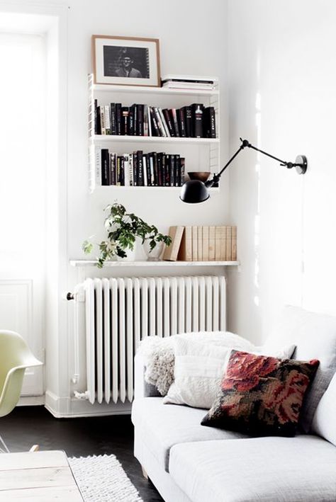 Make use of the space above your radiator with wall mounted shelves. Wall Heater Cover, Ideas Hogar, Small Space Solutions, Design Del Prodotto, Decoration Inspiration, Small Living Rooms, A Living Room, Small Living Room, Design Case