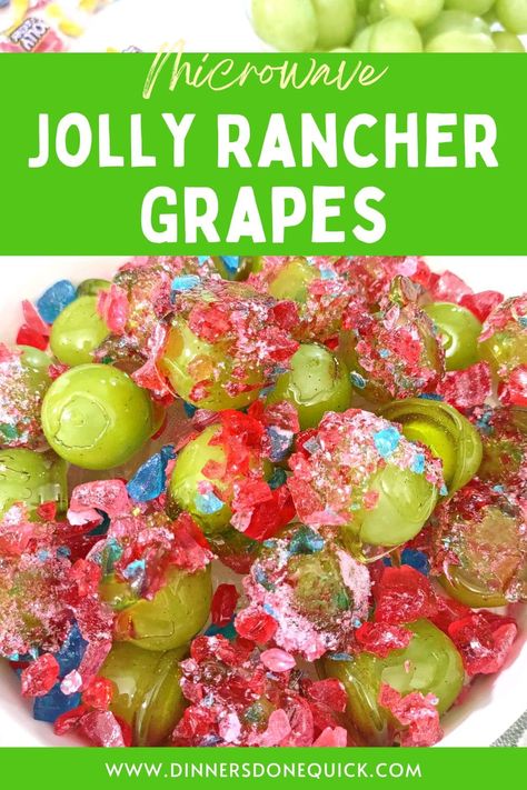 Looking for a sweet and crunchy snack? Use some microwave magic to make irresistible Jolly Rancher grapes in just a few minutes! These fruity delights are sure to satisfy your cravings. ✨🍇 #DinnersDoneQuick #HowtoMakeJollyRancherGrapes #JollyRancherGrapes #JollyRancherCandyGrapes #JollyRancherCoveredGrapes #CandiedGrapesJollyRancher #JollyRancherCoatedGrapes #Grapes #CandiedGrapes #JollyRancher #CandiedFruit #HowtoMakeCandiedFruit #HowtoMakeCandiedGrapes Candied Jolly Rancher Grapes, Sour Snack Ideas, How To Make Candy Grapes With Jolly Ranchers, Candied Grapes Recipes Jolly Rancher, Jolly Rancher Covered Fruit, Ragtag Candy, How To Melt Jolly Ranchers, Jolly Rancher Candy Grapes, Jolly Rancher Grapes Recipes