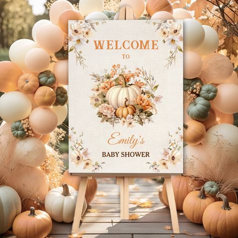 A little pumpkin is on the way, neutral pastel and elegant fall baby shower Welcome Sign Foam Board in boho farmhouse style, featuring two pumpkins surrounded by flowers in soft orange, cream, and green with autumn vintage vibes on the canvas background. Easily personalize the text. - Kate Eden Art A Pumpkin Is On The Way, A Little Pumpkin Is On The Way, Autumn Baby Shower Ideas, Pumpkin Baby Shower Theme, Pumpkin Theme Baby Shower, Lil Pumpkin Baby Shower, November Baby Shower, Fall Baby Shower Themes, October Baby Showers