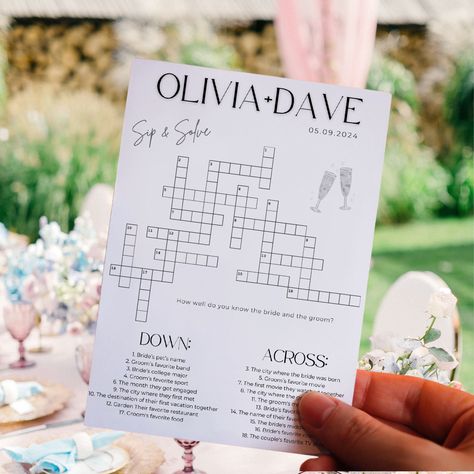 Custom Wedding Crossword Puzzle- Bridal Shower Sip and Solve Questions, Printable Engagement Guest Table Games, Editable Canva Template SEE SIMILAR ITEMS & DIFFERENT SIZES HERE: https://www.etsy.com/shop/DigitalCreationsByGG?ref=dashboard-header&search_query=crossword Make your wedding, bridal shower or engagement party unforgettable with our custom crossword puzzle! This unique and fun activity is perfect for entertaining your guests as they sip, solve, and celebrate your special day.  Features: - Interactive Entertainment: Keep your guests engaged with a delightful crossword puzzle filled with personalized questions about the bride and groom. - Perfect Size: The 5x7" size makes it easy to place at each guest's seat or display on a guest table. - Editable Template: Customize the questions Sip And Solve, Wedding Crossword Puzzle, Guest Table, Dashboard Header, Wedding 2025, Getting Engaged, Crossword Puzzle, Table Games, Printable Designs