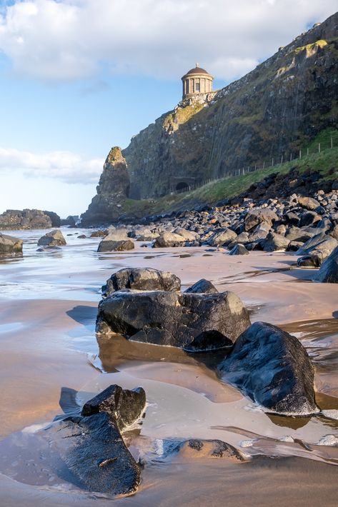 Mussenden Temple on the edge of cliffs overlooking the beach at Downhill in Northern Ireland. Downhill House, Londonderry Ireland, Mussenden Temple, Edge Of A Cliff, Ireland Photography, A Mansion, Londonderry, North Coast, Documentary Photography