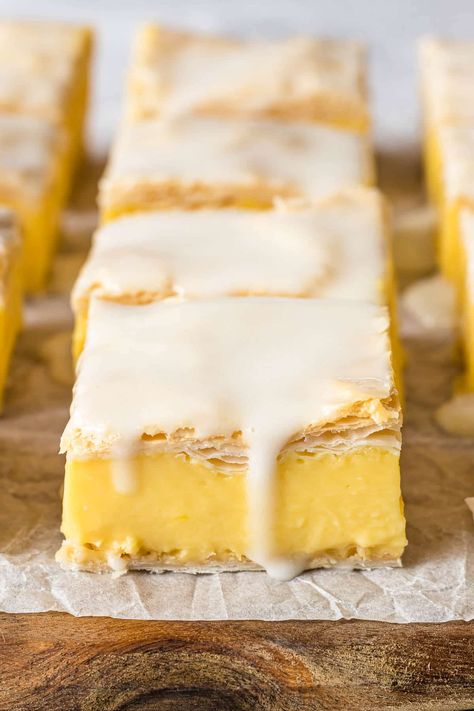 This delicious easy vanilla custard slice has a delightful creamy vanilla custard filling sandwiched between layers of puff pastry and topped with a glaze. Custard Slices Recipe, Easy Custard Slices Recipe, Vanilla Slices Recipes, Custard Slice Recipe Easy, Vanilla Slice Recipe Puff Pastries, Easy Vanilla Slice, Custard Squares Recipe, Custard Slices With Puff Pastry, Puff Pastry Custard Recipes