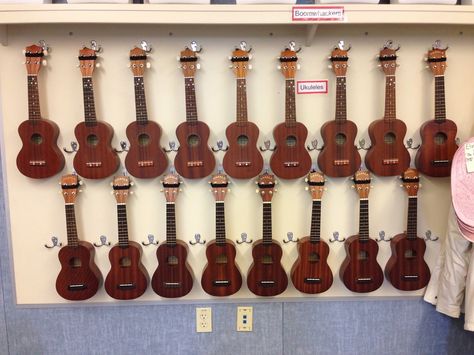 Music with Ms. Ulrich - a brand new blog.  It has details on how to get this great look. ;-)  Display ukuleles in music classroom and encourage easy access for students. Ukulele Storage, Teaching Ukulele, Music Room Organization, Orff Lessons, Learning Ukulele, Guitar Storage, Cool Ukulele, Middle School Music, Music Ed