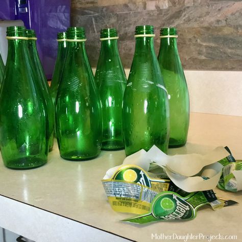 Green Glass Bottle Christmas Decor - Mother Daughter Projects Green Bottles Decor, Green Bottle Crafts, Green Glass Bottles Decor, Green Bottle Art, Bottle Christmas Decor, Mother Daughter Projects, Eco Friendly Diy, Green Glass Bottles, Alternative Christmas