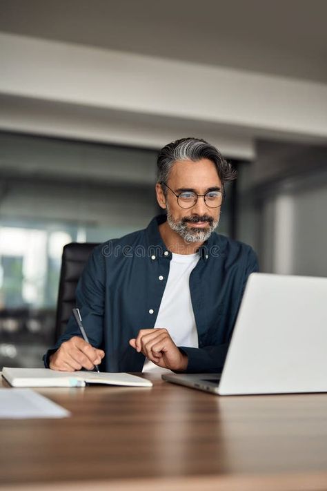 Older busy businessman writing notes learning online sitting at office desk. royalty free stock images Business Man Photography, Law Firm Branding, Business Finance Management, Team Photoshoot, Photography Office, Finance Management, Business Portrait Photography, Finance Career, Professional Photo Shoot