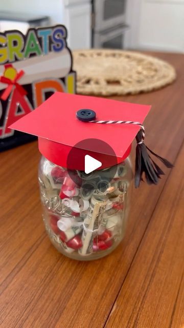 Hip2Save | Legit deals only. Follow for the best savings around! on Instagram: "Attending a grad party? These DIY graduation mason jars make the perfect gift! 👩🏼‍🎓🧑🏼‍🎓  Comment LINK and we’ll DM you a link with all the details & directions!  *These DIY jars can also be used as a party centerpiece! Swap out the dollar diplomas for candy, confetti, or any other grad fillings!  #diy #graduation #giftidea #grad #graduationgift #hip2save @ballcanning" Graduation Mason Jars, Graduation Hat Toppers, Mason Jar Party Favor, Diy Jars, Candy Centerpieces, Graduation Candy, Graduation Money, Diy Graduation, Grad Ideas