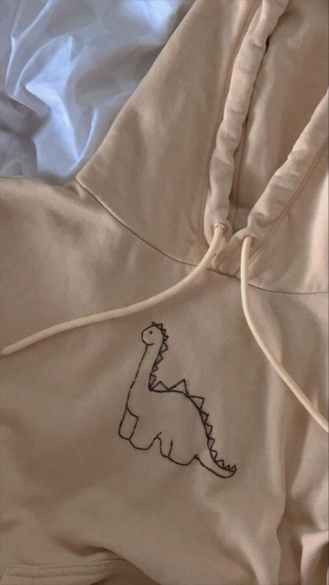 embroidery, embroidery hoodie, embroidery clothes, embroidery dino Embroidery Designs For Hoodie, Hand Embroidery Hoodie, Broderie Aesthetic, Tshirt Embroidery Diy, Embroidery Hoodie Diy, Embroidered Hoodie Diy, Hand Embroidery Tshirt, Dino Embroidery, Hoodie Diy