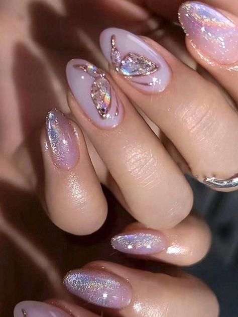 Gel Nails Almond Glitter, Butterfly Nails Glitter, Nail Inspo Butterflies, Colorful Manicure Ideas, Blue And Gold Butterfly Nails, Magnetic Almond Nails, Iridescent Floral Nails, Blue And Glitter Nail Ideas, Ethereal Nails Acrylic Almond