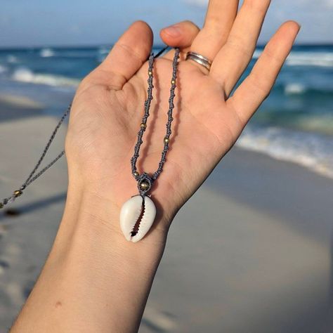 🌊✨ New Favorite! ✨🌊 Adorable cowrie shell necklace, perfect for that beachy vibe. �🐚💖 #MacrameNecklace #CowrieShell #HandmadeWithLove #cozyjewelry 🦋 #MacrameJewelry #HandmadeJewelry #BohoJewelry #Knotting #MicroMacrame #handmadejewelry #jewelry #macrame #necklace #crystaljewelry #necklace #jewellery #artjewellery #bracelets #macrameart #handmade #macramelove Cowrie Shell Necklace, Edgy Jewelry, Mini Macrame, Macrame Art, Belly Chain, Macrame Necklace, Shell Necklace, Cowrie Shell, Micro Macrame