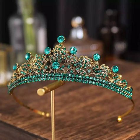 Beautiful Handmade Gold Bridal Tiara Encrusted with Stunning Emerald & Crystals. Also in Black & Gold Add romantic charm to your Bridal Outfit with this beautiful Bronze and Emerald Crystal Tiara Our Beautiful Headpiece is exquisitely handmade with Stunning Sparkly Crystals. Make a Statement and wow your Bridal party with this Beautiful Gold and Green Tiara Material Alloy Crystals Rhinestones Tiara Adjusts to size Diameter:14 CMS Height: 5 CMS Thank you Gold Bridal Headband, Headband Wedding Hair, Flower Girl Tiara, Bride Hair Jewelry, Girls Tiara, Bridal Tiaras, Vintage Tiara, Wedding Hair Headband, Bride Tiara