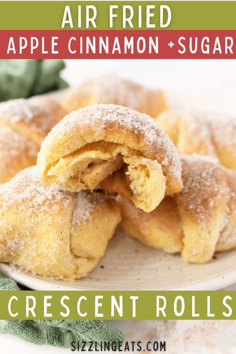 Air Fried Crescent Apple Rolls with Cinnamon Sugar. If you are looking for a quick and easy dessert recipe, this one is perfect! Crescent apple rolls with cinnamon sugar will take just a few minutes to put together. Featuring store-bought crescent dough, freshly fried apples, and a buttery cinnamon and sugar coating, these treats can be air fried or baked in the oven for the perfect treat! #crescentrolls #applecrescents #apples via @sizzlingeats Apple Crescent Roll Dessert, Crescent Roll Apple Turnovers, Apple Cinnamon Crescent Rolls, Cinnamon Sugar Crescent Rolls, Fresh Apple Recipes, Apple Crescent Rolls, Apple Rolls, Pillsbury Crescent Roll Recipes, Recipes Using Crescent Rolls