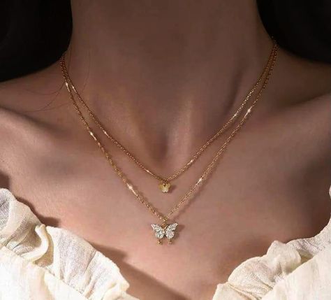 • Material: Alloy • Color: Gold Plated Chain • Pendant: Butterfly • Unique Korean Design • Keep Away From Dust And Moist • Double Chain Style • For Party Wear #aesthetic #ａｅｓｔｈｅｔｉｃ #jwellery #necklace #koreanjewelry #aestheticjewelry #elegantjewelry #HandcraftedJewels #JewelryObsession #JewelryInspiration #explorepage #pintrestjwellery #pintrestjwelleryvibes Korean Jwellery Aesthetic, Korean Chain Necklace, Korean Jwellery, Style For Party, Butterfly Unique, Budget Bridesmaid Dresses, Pendant Butterfly, Chains Aesthetic, Cute Promise Rings