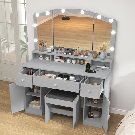 PRICES MAY VARY. Product Size：15.7"D x 43.3"W x 60.2"H Storage Rich Vanity：Our vanity desk has 3 drawers, 2 cabinets, 1 long storage shelf and 1 spacious table top to hold all your beauty supplies, makeup, hair tools and more. The storage space is as amazing as a manual showing you where everything goes. Perfect for maximizing storage space in the smallest area Vanity Desk with Triple Folding Mirror：With FIONESO large lighted triple folding mirror vanity(Mirror Size: 39.4"L*22.8"W), you will no Light Gray Bedroom, White Vanity Desk, Mirror Makeup Vanity, Women Bedroom, Makeup Vanity Table, Teenage Girl Room, Rich Design, Folding Mirror, Mirrored Vanity Desk