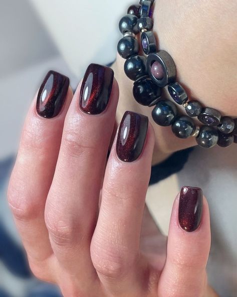 Stunning Fall Cat Eye Nails 2024 25 Ideas - Red, Green, Blue & More Designs Dark Red Cats Eye Nails, Black Cherry Cat Eye Nails, Cat Eye Dark Nails, Dark Red Cat Eye Nails, Red Cat Eye, Burgundy Cat Eye Nails, Eye Cat Nails, Red Cat Eye Nails Design, Red Cat Eye Nails