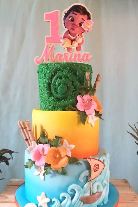 Don't miss this tropical Moana 1st birthday party! Love the birthday cake! See more party ideas and share yours at CatchMyParty.com  #catchmyparty #partyideas #moana #moanaparty #moanacake#luau# girl1stbirthdayparty #moanacake Two Year Old Moana Birthday Party, Moana First Birthday Cake, Moana 2 Birthday Party Ideas, Moana Birthday Shirt, Moana Pool Birthday Party, Baby Moana Birthday Party Decorations, Moana First Birthday Party Ideas, Moana 3rd Birthday Party, Moana Birthday Party Ideas Cake