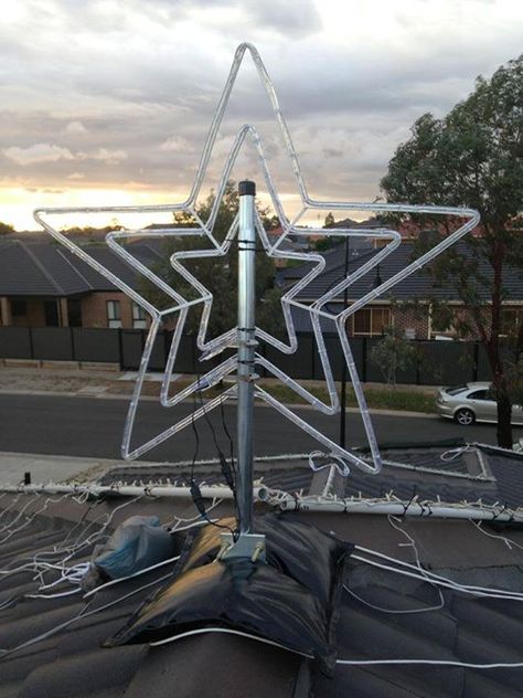 Christmas Light Roof Ideas, Galvanized Pipe, Sand Bag, Landscaping Supplies, Xmas Lights, Tv Antenna, Roof Tiles, Christmas Star, Outdoor Christmas Decorations