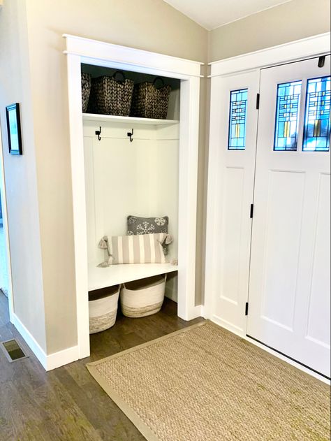 Closet Near Front Door, Small Built In Coat Rack Entryway, Hall Closet Mudroom Makeover, Coat Closet Layout, Entrance Closet Remodel, Bench In Coat Closet, Small Coat Closet Turned Mudroom, Coat Closet To Entry Nook, Coat Closet Makeover Small