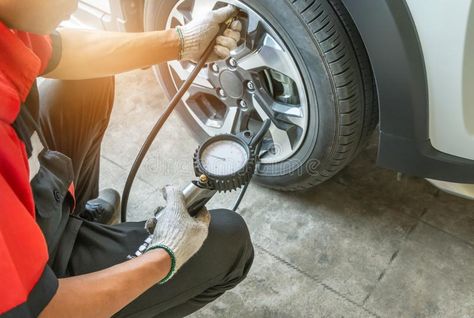 Mechanic inflating put air into the tyre and checking air pressure with gauge pr , #AFFILIATE, #air, #tyre, #put, #Mechanic, #inflating #ad Wheel Alignment, Service Station, Pressure Gauge, Tyre Shop, Brake Fluid, Air Pressure, Air Conditioning System, Starter Motor, Driving Experience