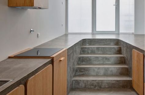 Kitchen Counter Floors - The Flower House Embodies an Interior of Escher-Esque Overlaps (GALLERY) Sunken Kitchen, Concrete Kitchens, Polished Concrete Kitchen, Concrete Room, Dining Room Floor, Concrete Interiors, Flower House, Apartment Buildings, Making Food