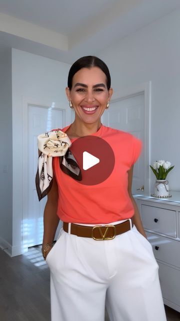 Doranellys Patton on Instagram: "🌹T-shirt is $10!☀️To shop:🧣Comment ROSE and I’ll send you the details right away.  Outfit in my “April” stories highlights. And my @shop.ltk  as @doranellyspatton in bio.  Two ways to elevate your outfit with a scarf flower. A great way to elevate your basics, like a T-shirt, tank top or a dress. Perfect with a vest or blazer too! Scarf size is 34” x 34”  📍Share, Save and follow for more! 💖Remember to turnon Reels Notifications, so you don’t miss any of my reels.  🚫Do not repost my videos without my consent ©  #howtotieascarf #scarfstyle #scarfs #scarfseason  Style tips, fashion hacks, T-shirt, scarf tutorial, casual outfits, how to wear" How To Make A Flower With A Scarf, Outfit With A Scarf, Scarf Rose, Scarf Wearing Styles, Scarf Flower, Shirt Scarf, Scarf Knots, Business Jacket, Scarf Tutorial