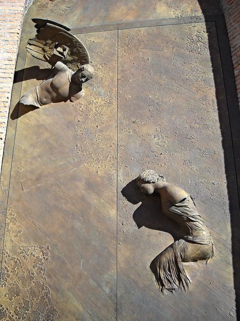 Igor Mitoraj (Polish, 1944–2014), "Annunciation," 2005. Bronze door, Santa Maria degli Angeli Church, Rome. Bronze Doors, Igor Mitoraj, St Maria, Bronze Door, Son Of God, St Mary, Stone Work, Art Sculptures, Rome Italy