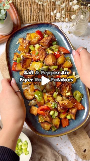 Chloe 🌸 on Instagram: "AIR FRYER SALT & PEPPER ROAST POTATOES 😍😍
Save these!😍They were something else 😍😍😍

Add your potatoes (cut into small pieces) into the air fryer with a generous amount of oil and salt & pepper. I did mine for around 30 minutes on 180 until crisp. I added onions in at around 25 mins

Once potatoes are crispy add in 
1 tsp brown sugar
1/2 tsp ground black pepper
½ tsp ground white pepper
½ tsp Chinese five-spice
½ tsp salt
1 onion sliced
3 peppers (mixed colours) 
1 tsp lazy garlic​
1/2 tsp chilli flakes 
1/2 tsp ginger
To the air fryer for around 15 mind
1 spring onion, finely sliced, to serve 😍😍 

They wont disappoint! Let me know if you try them! #airfryerpotatoes #roastpotatoes #saltandpepper #saltandpepperchips #roasties #crispypotatoes #airfryerrecipes # Salt And Pepper Chips, Roast Potatoes, Crispy Potatoes, Chilli Flakes, Potato Dishes, White Pepper, Spring Onion, Ground Black Pepper, Fryer Recipes