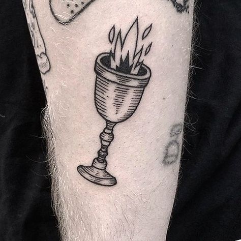 Tattoo design pulled from google images Goblet Of Fire Tattoo, Chalice Tattoo, Harry Potter Goblet Of Fire, Harry Potter Goblet, Traditional Tattoo Old School, Cup Tattoo, Engraving Tattoo, L Tattoo, Fire Tattoo