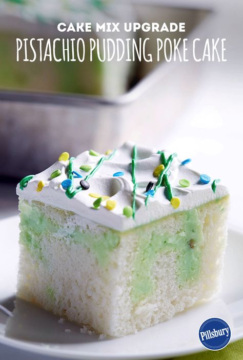 Our Pistachio Pudding Poke Cake is the perfect cake for any occasion. With ingredients like pistachio pudding,  whipped topping, green frosting and white cake mix, you will have a delicious dessert to impress your guests! Pistachio Pudding Cake, Premium Cake, Pudding Poke Cake, Pistachio Dessert, Pistachio Recipes, Pistachio Pudding, Poke Cake Recipes, Poke Cakes, White Cake Mixes