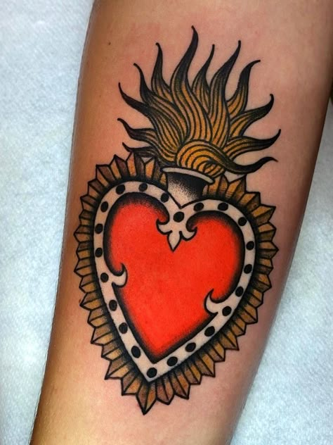 Tattoo uploaded by Tattoodo | sacred heart tattoo by jonnys hand #johnnyshand #sacredheart #fire #traditional | 1489134 | Tattoodo Traditional Heart Tattoos, Tato Tradisional, Sacred Heart Tattoos, Traditional Tattoo Flowers, Omerta Tattoo, Explore Tattoo, Fire Tattoo, Old School Tattoo Designs, Heart Tattoo Designs