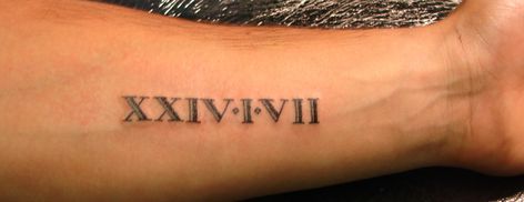 Roman Numeral Forearm Tattoo Roman Numeral Tattoo Arm, Roman Numeral Wrist Tattoo, Roman Numeral Tattoo Font, Roman Numbers Tattoo, Tattoo Font For Men, Roman Tattoo, Tattoo Samples, Roman Numeral Tattoo, Numeral Tattoo