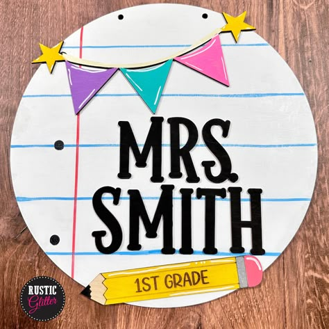 Make your classroom stand out with a personalized 3D sign! This fun Teacher Classroom Notebook Paper Name Sign is also perfect as a gift for any teacher. This is a DIY kit that comes unfinished and ready to paint. Available in three sizes: 12.5", 15", or 18" Please note: Longer names will be smaller in size. Fonts are as shown. Wood pieces are laser-cut and engraved. Pieces may vary in coloration due to cut and grain. Wood contains knots, laser marks, and may have slight imperfections adding to Cricut Teacher Door Sign, Circle Teacher Door Hanger, Diy Classroom Signs, Signs For Teachers Classroom, Diy Teacher Signs Classroom Decor, Classroom Door Signs Teacher Name Diy, Teacher Classroom Door Signs, Classroom Door Signs Teacher Name, Diy Teacher Sign